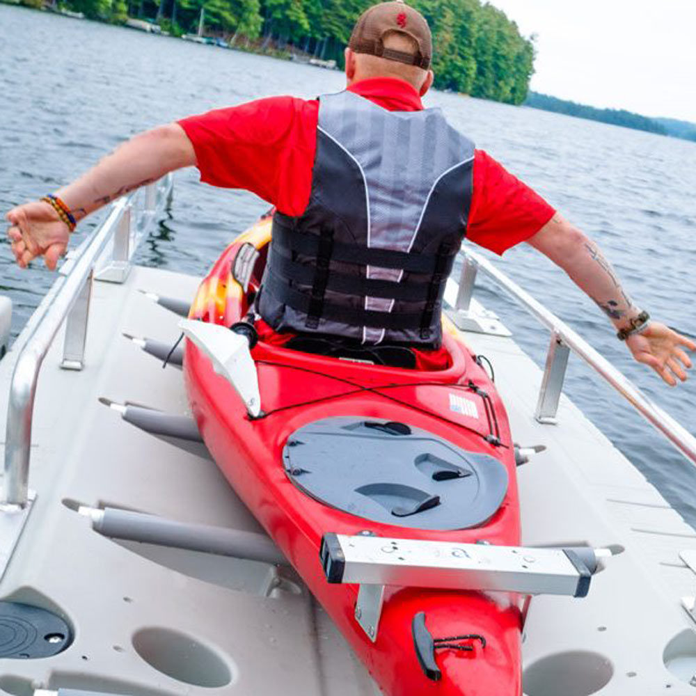 The one-way EZ Launch system allows you to easily launch or dock your canoe or kayak by pushing forward on aluminum rails that extend over the water.